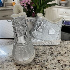 Sorel x Disney Silver Boots with White Lining. Women’s size 9 like new